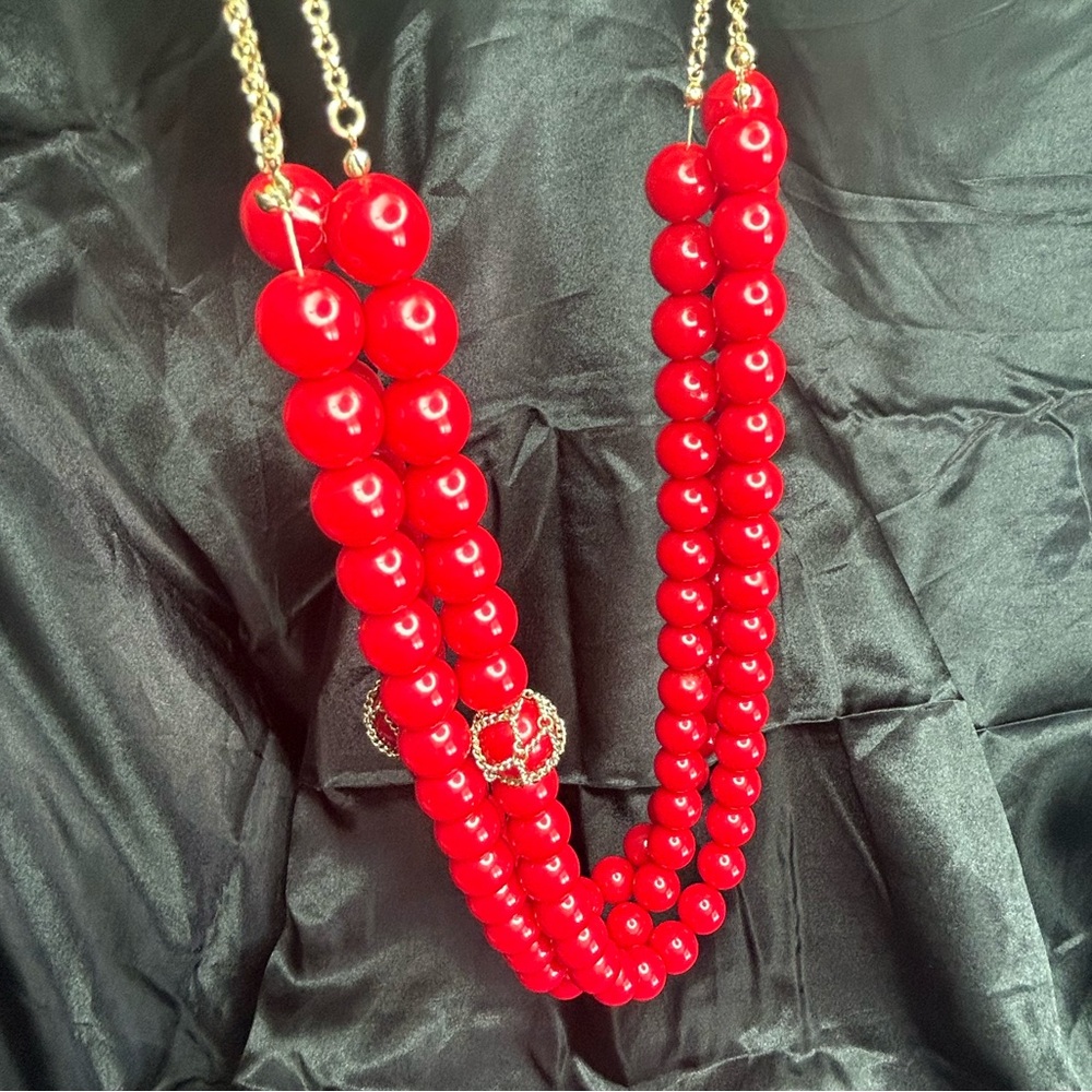 Chunky layered red beaded necklace, three layered.